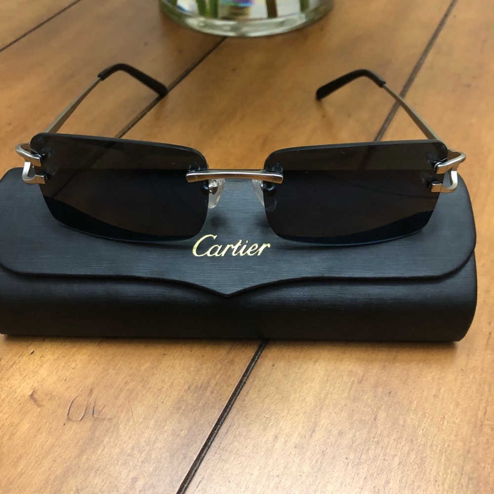 Cartier woman’s sunglasses new black and silver